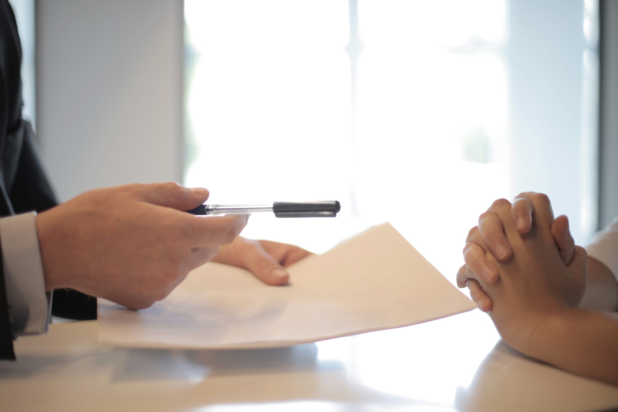 Handing over a Divorce Agreement - Divorce Attorney New Jersey