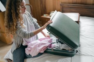 Teen Packing to Move Away From Home - Family Law Lawyers