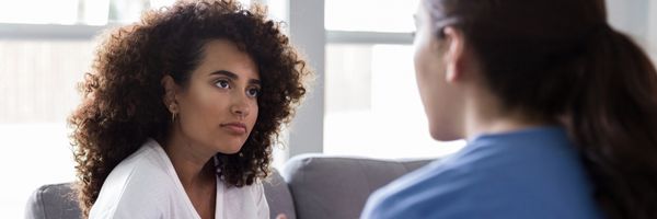 two women talking about their life experiences